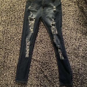 Dark denim skinny jeans with rips